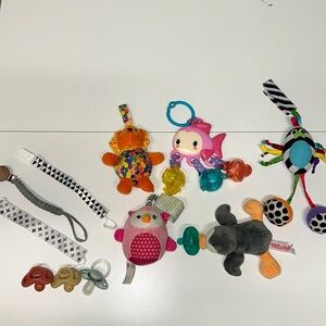 Baby hanging toys and pacifier bundle